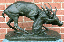 panther attacking a stag bronze sculpture